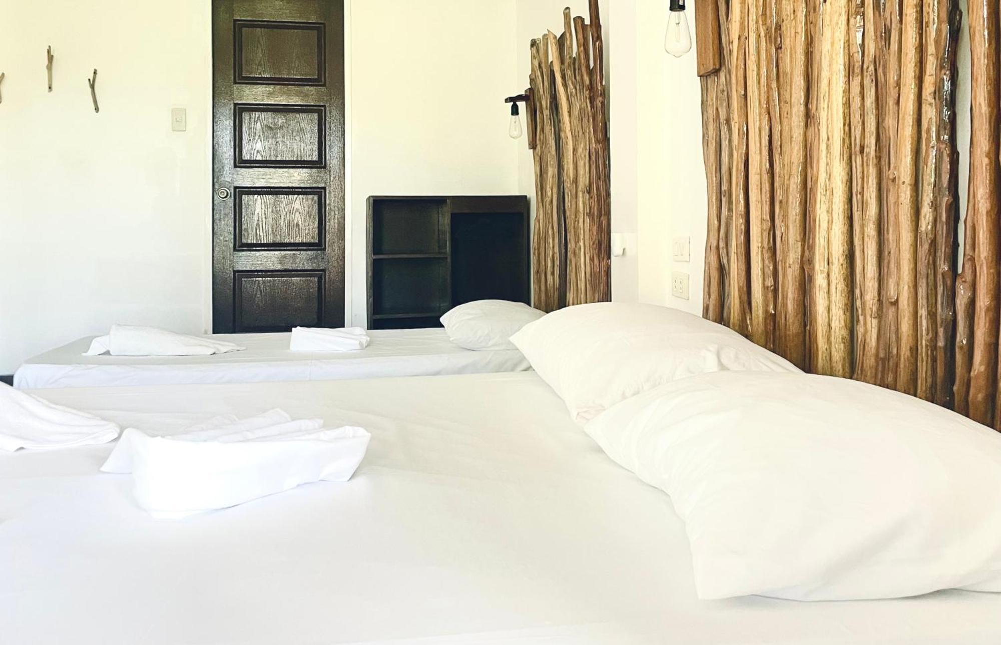 Siargao Sunflower Suites Генерал-Луна Экстерьер фото