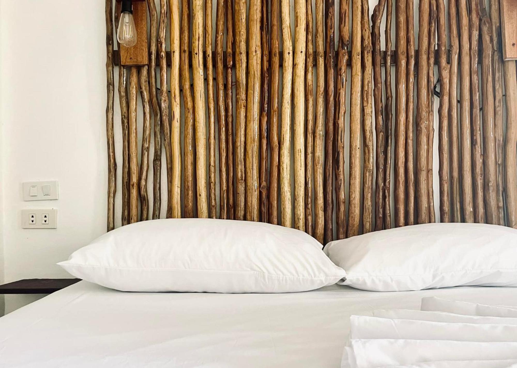 Siargao Sunflower Suites Генерал-Луна Экстерьер фото